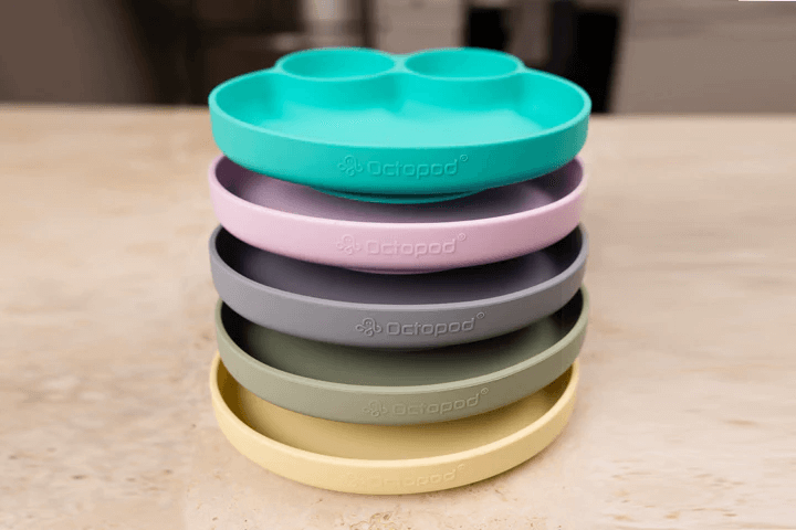 stack of octopod silicone baby dishware