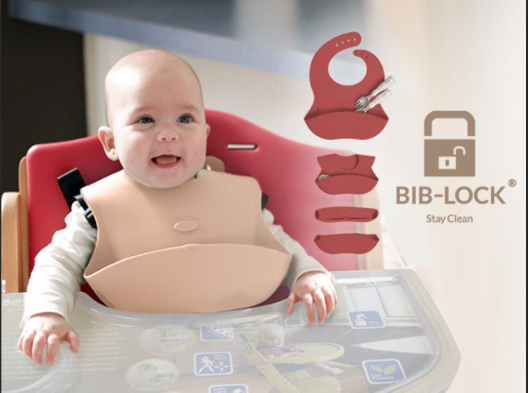 a baby wearing the best silicone bib