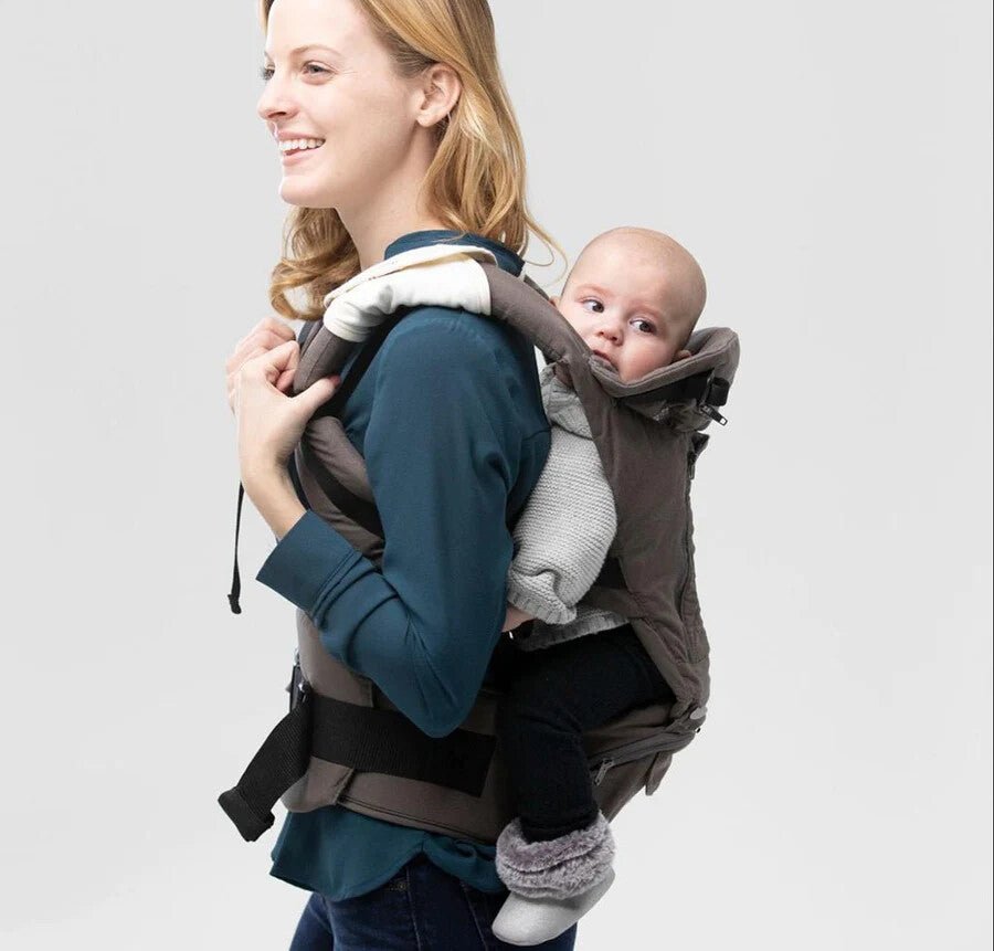 woman carrying baby on her back